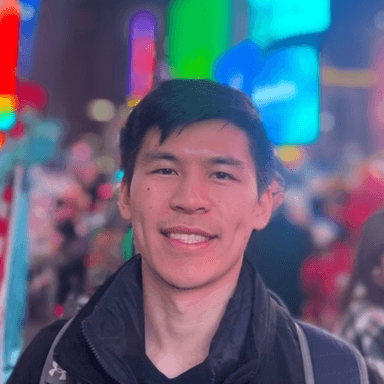 Alex standing in Times Square, New York City.